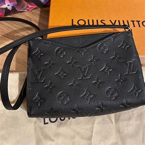 louis vuitton employee bag.